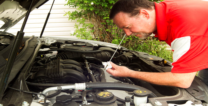 Car Fluid Checks - Cottman Man - Cottman Transmission and Total Auto Care